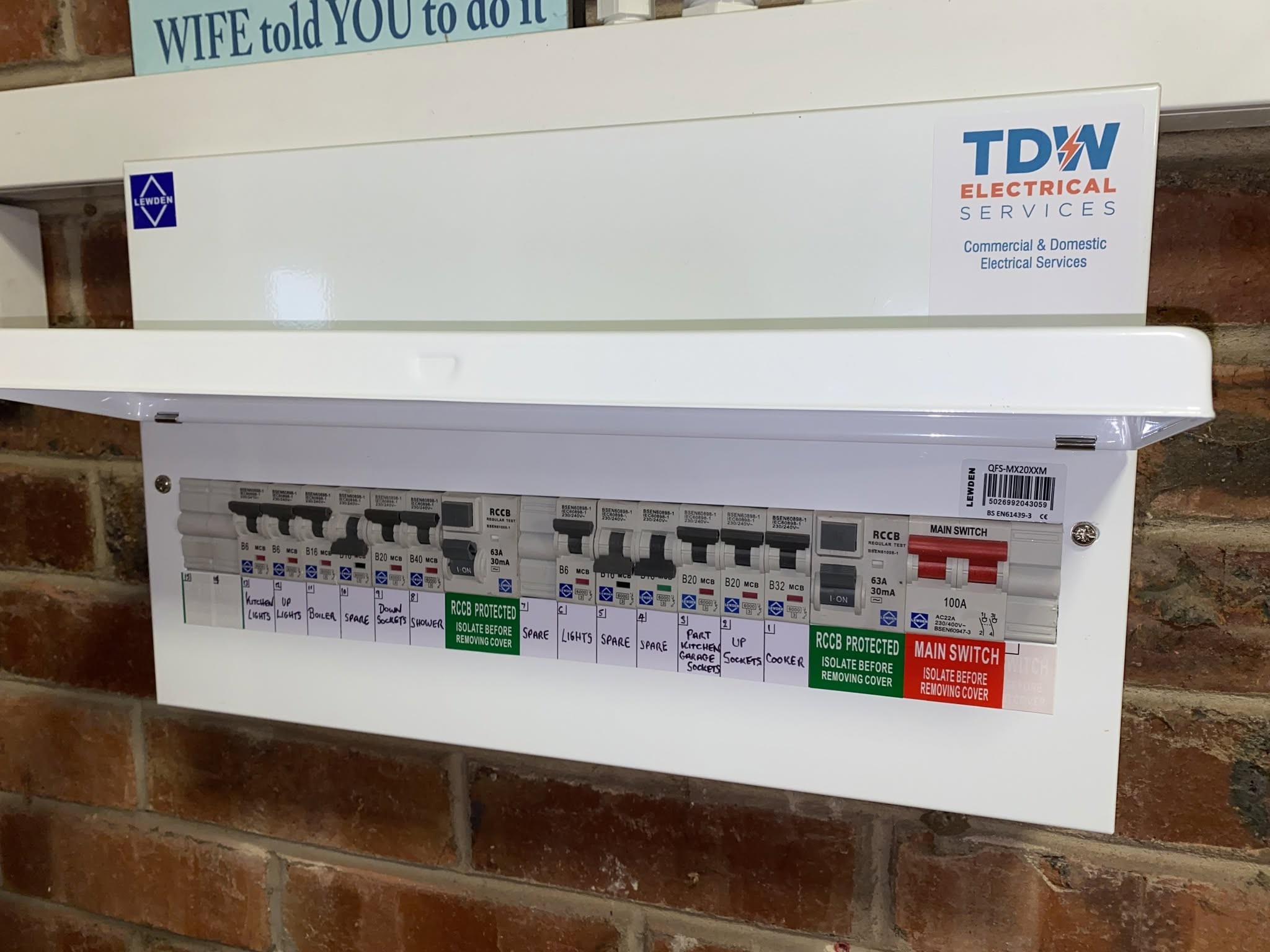 New consumer unit with the TDW Electrical Services sticker on the cover